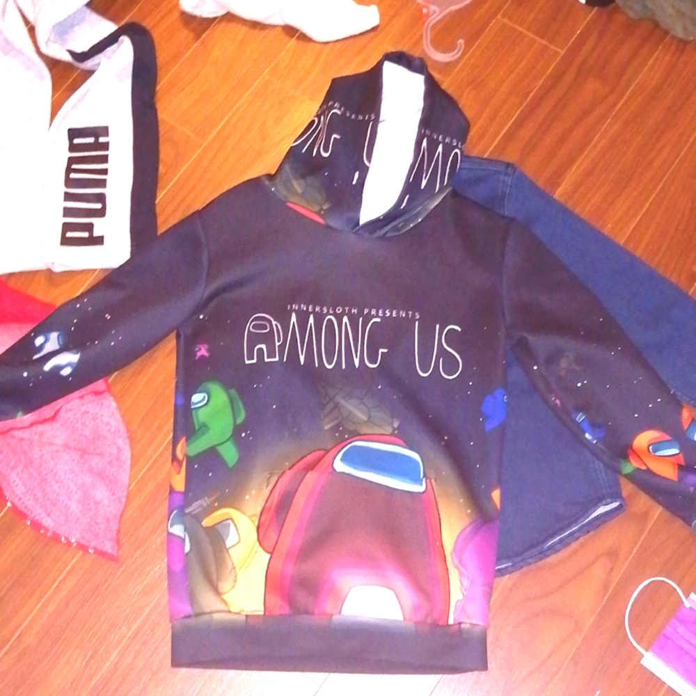 Among us boys sweater size small would fit anywhere from a size 6 to 8